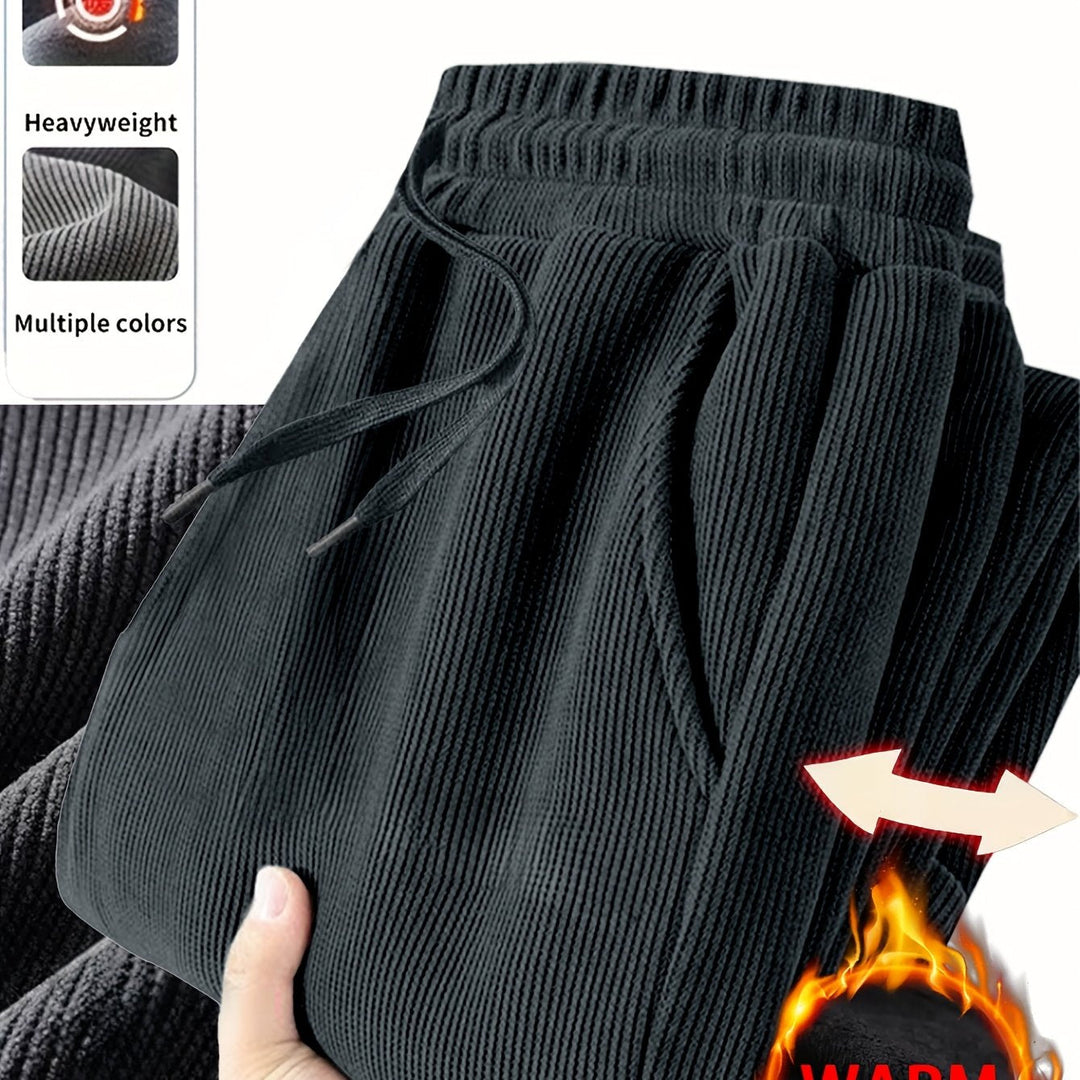 Herbst/Winter Herrenhose, warm & bequem, gefüttert, schwarz, ideal als Freizeithose für kalte Tage.