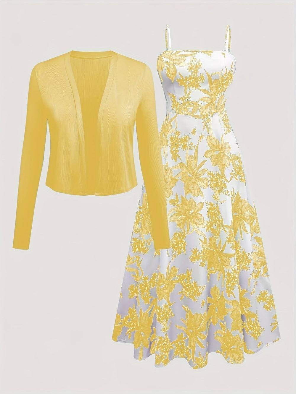 Nahaufnahme des frischen Blumenmusters auf dem sommerlichen Midikleid & Cardigan Set für Damen.
