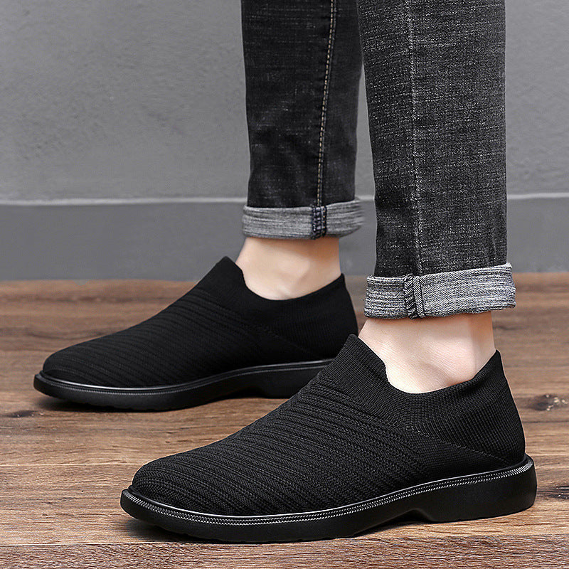 Bequeme Herren Sommer Sneaker in Schwarz. Atmungsaktive Freizeitschuhe mit leichter, flacher Sohle für Männer.