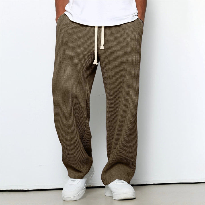 Athleisure-Herrenhose: locker geschnitten, gerades Bein. Komfortable Wahl für aktive Tage und entspannte Freizeit.