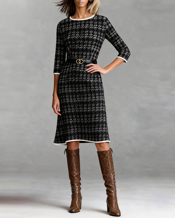 Komfortables schwarzes A-Linien Kleid für Damen mit Dreiviertelärmeln, ideal für elegante Herbsttage.