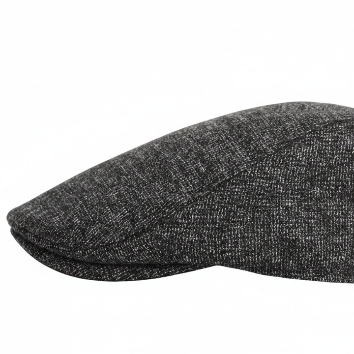 Dunkle Herren Cabbie Mütze im klassischen Design. Vintage-Look für Herrenmode im Herbst & Winter.