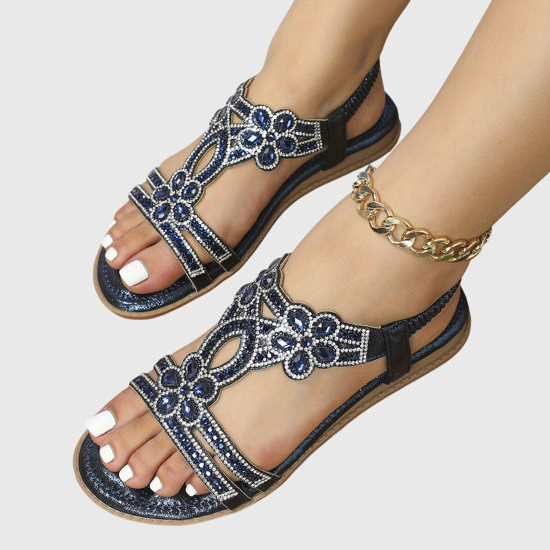 Schicke Damen-Flachsandalen, himmelblau, mit verstellbarem Fersenriemen.