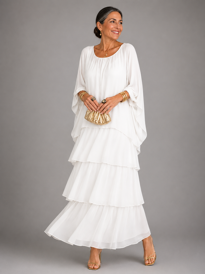 Langes Damen Abendkleid mit raffinierter Drapierung, die die Figur elegant umspielt; Abendmode.