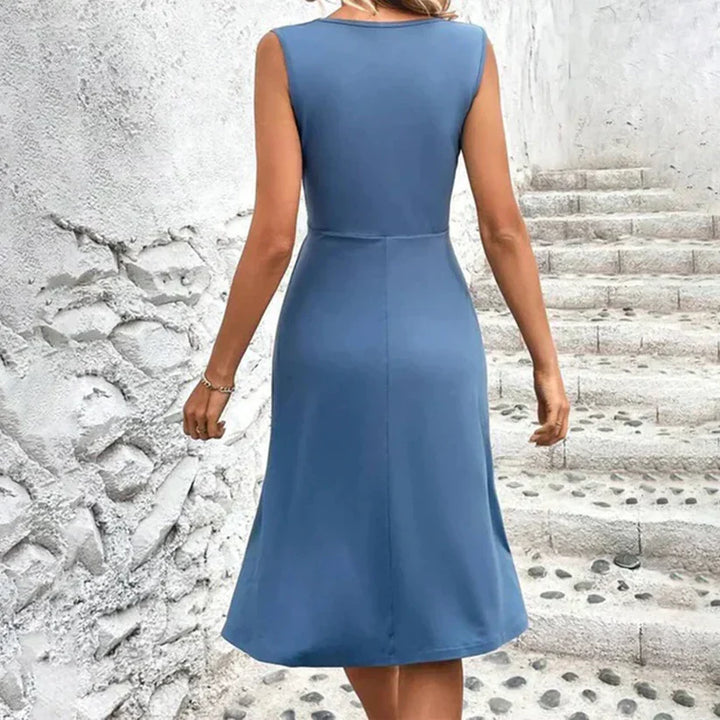 Fließendes Damen Midikleid mit Blumenprint, festlich & elegant. Perfekt für Hochzeiten & Partys.