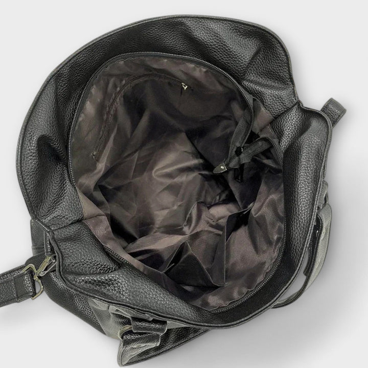 Stilvolle Alltagstasche: Damen Hobo-Tasche aus Kunstleder, vielseitig als Schultertasche oder Handtasche tragbar.