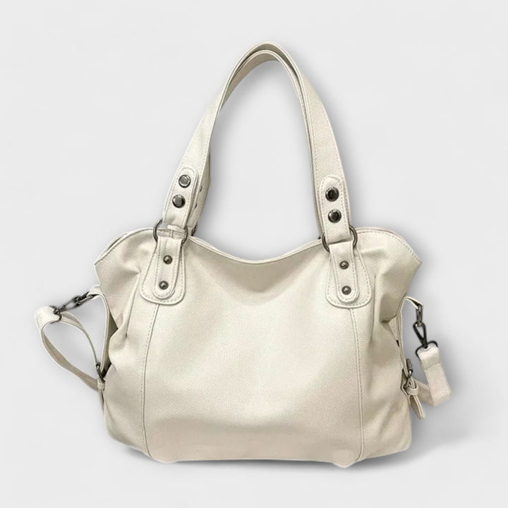 Zeitlose schwarze Hobo-Handtasche für Damen, aus hochwertigem Kunstleder, ideal als elegante Alltagstasche.