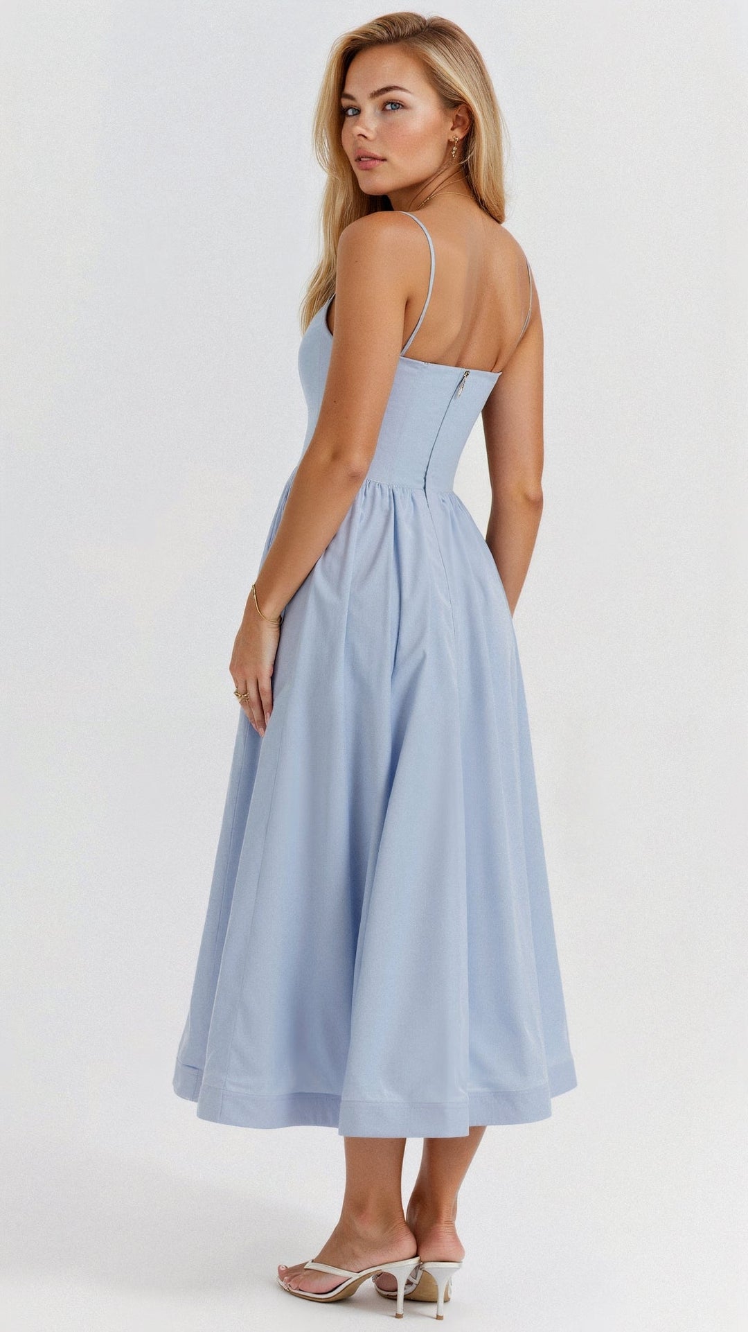 Damen Midikleid für stilvolle Herbstmode. Elegantes, ärmelloses Design, perfekt für besondere Anlässe.