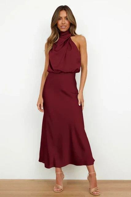 Dunkles, elegantes Off-Shoulder Midikleid für Damen. Perfekt kombiniert für festliche Herbstabende und Partys.
