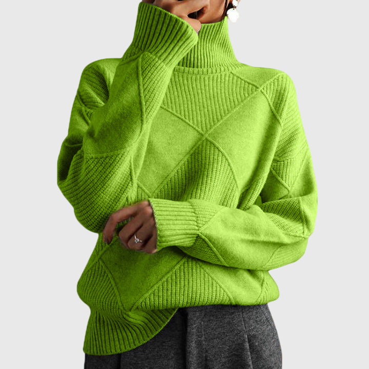 Damen Langarmpullover, schlank geschnitten, mit geometrischem Print & Rollkragen. Ideal für den Alltag.