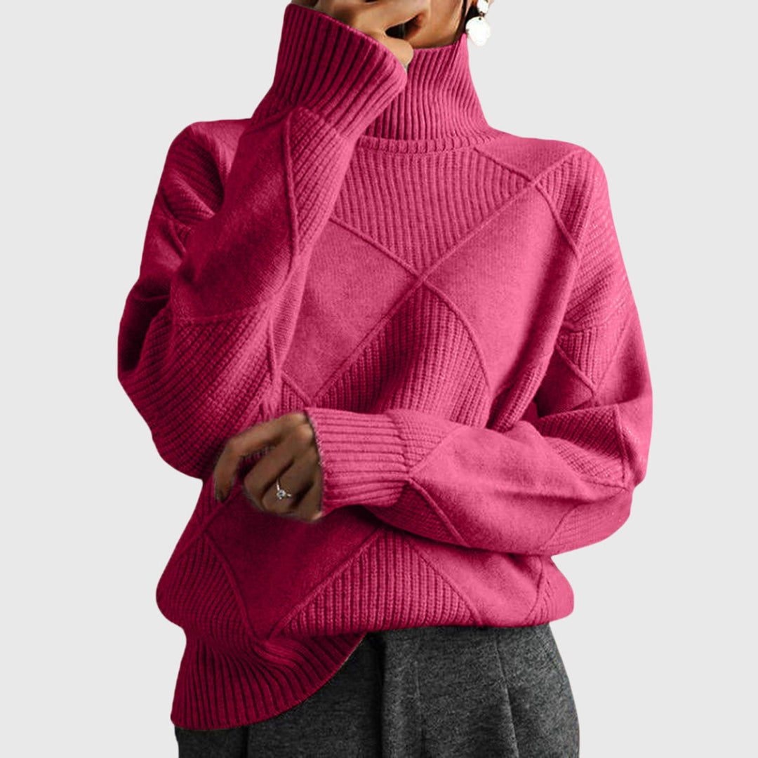 Moderner Damen Winterpullover: geometrischer Rollkragen, figurbetont. Trendige Herbstmode für Frauen.