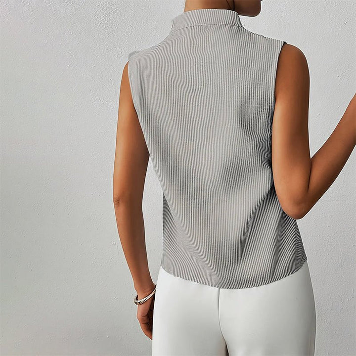 Vielseitige Damen Streifenbluse mit Stehkragen, ärmellos, perfekt kombinierbar für Sommer & Herbst.