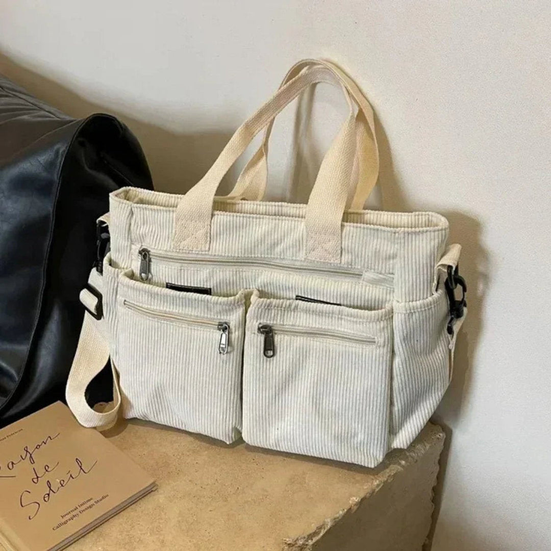 Vielseitige Kordstoff Tragetasche für Damen, nutzbar als Handtasche oder Umhängetasche, mit viel Stauraum.