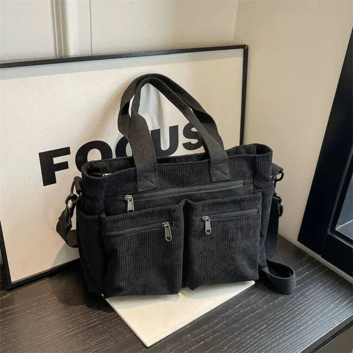 Geräumige Kordstoff Tragetasche für Damen mit Mehrtaschen und verstellbarem Umhängeriemen für den Alltag.