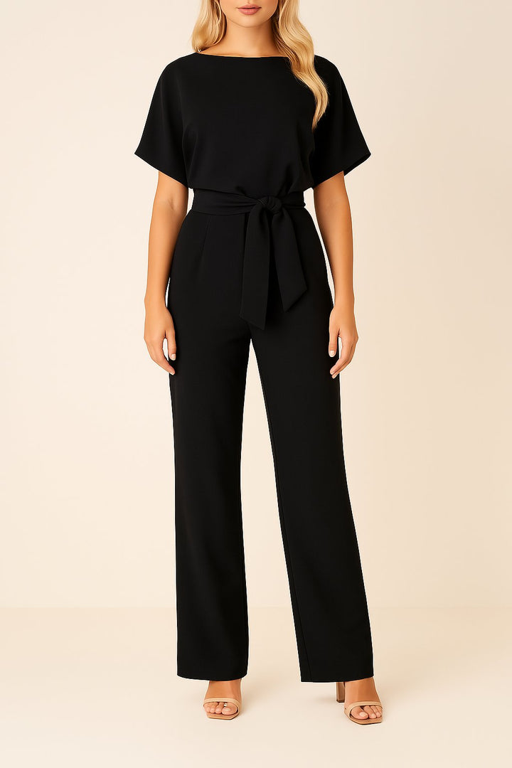 Damen Kurzarm Jumpsuit Elisa mit elegantem Bindegürtel und weitem Bein. Ideal für Frühling und Sommer.