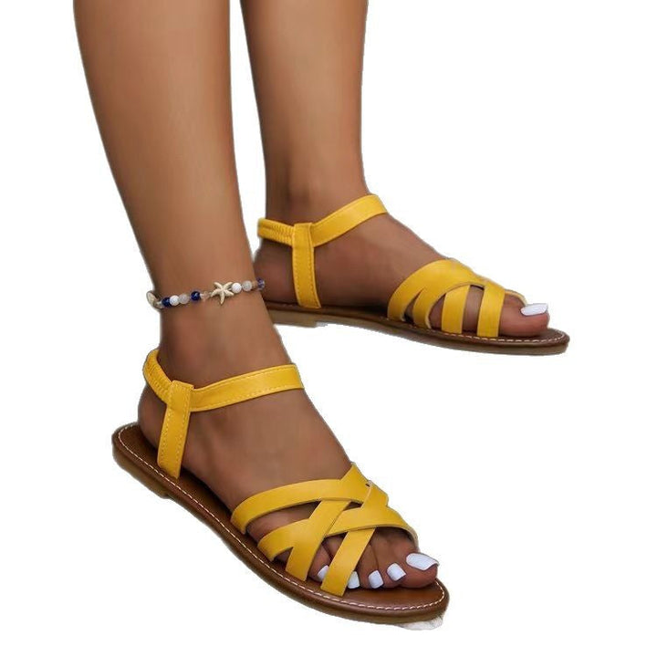 Elegante Flache Sandalen für Damen, mit bequemer Passform und verstellbaren Details für jede Fußform.
