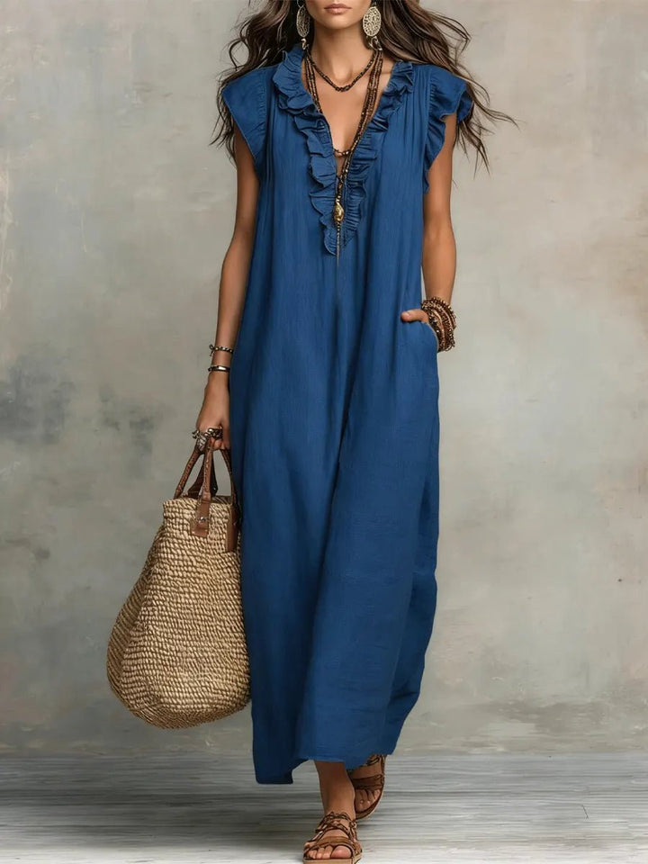 Sommerliches langes Damen Maxikleid mit fließendem Stoff. Ideal als Urlaubskleid oder für Freizeit.