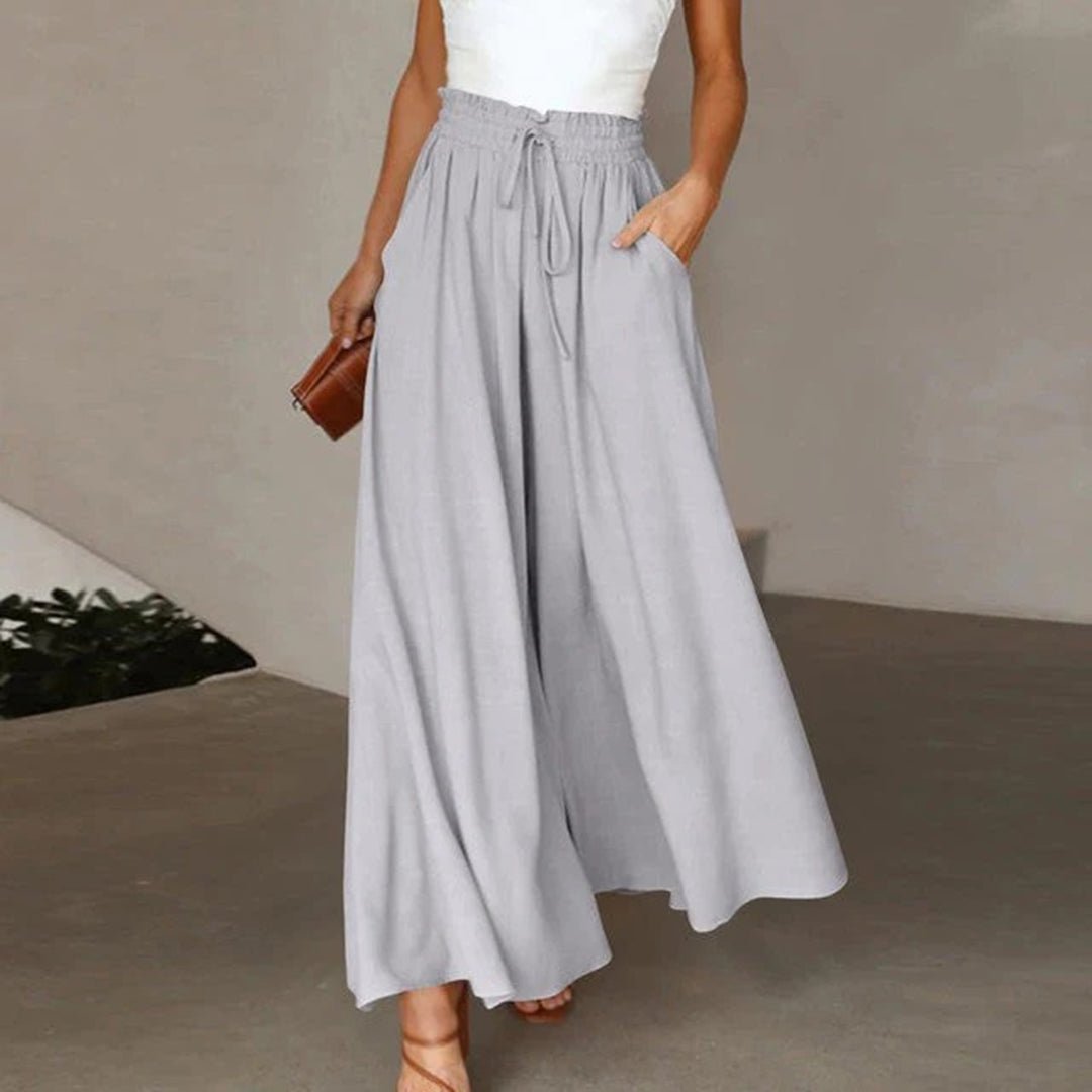 Elegante, luftige Damenhose mit hohem Bund & weitem Bein. Feminine Mode für stilvollen Sommer.