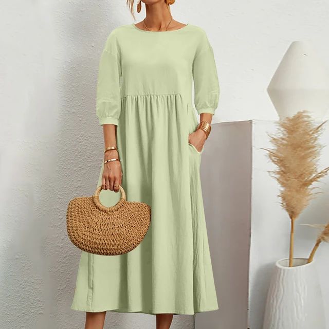 Rückenansicht des eleganten, unifarbenen Damen Maxikleides, fließender Schnitt für den Sommer.