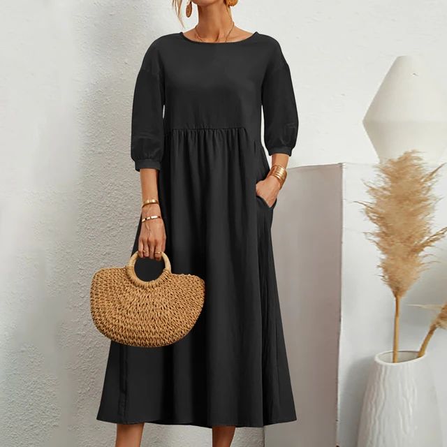Nahaufnahme des leichten Stoffes vom unifarbenen Damen Sommer Maxikleid, zeigt luftige Qualität.