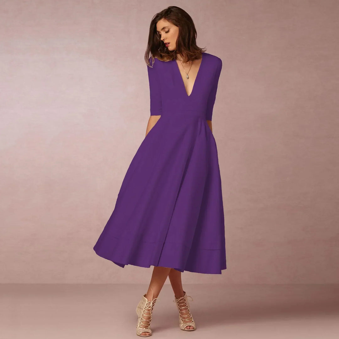 Seitliche Ansicht des fließenden Damen Midikleids. Elegant & luftig, perfekt für Sommer & Freizeit, sehr bequem.