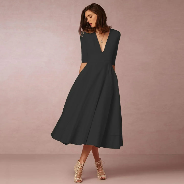 Elegantes Damen Midikleid, fließend & stilvoll. Perfekt als festliches Kleid oder luftiges Sommerkleid, sehr modisch.