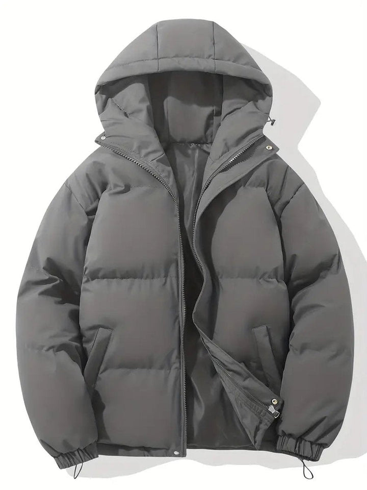 Robuste Damen Pufferjacke mit Kapuze. Eine warme und modische Outdoormode für Herbst & Übergangszeit.