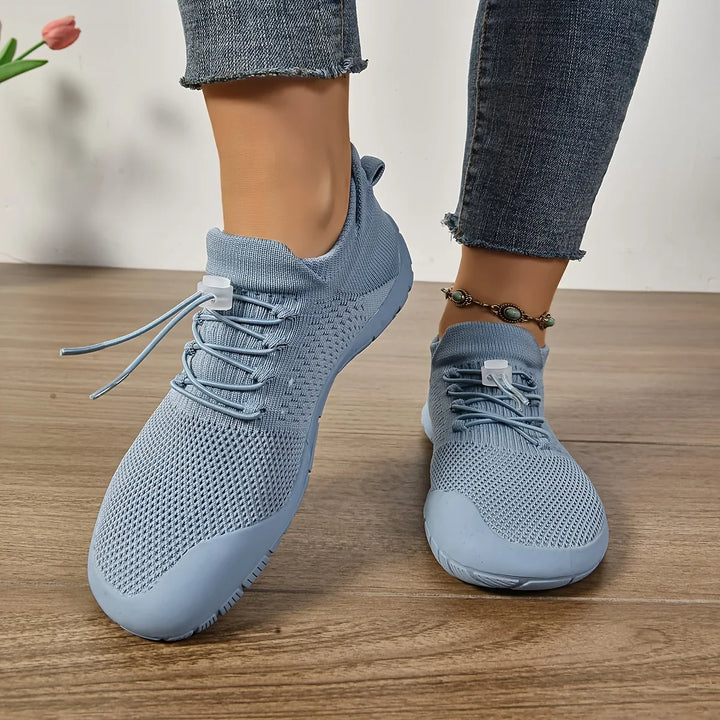 Unisex Barfussschuhe, schwarz, minimalistisch, flexibel für natürliches Laufen und Alltag.