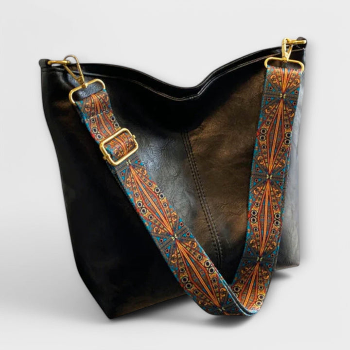 Elegante weiche Damen Handtasche im Vintage-Stil, perfekt als praktische Alltagstasche.