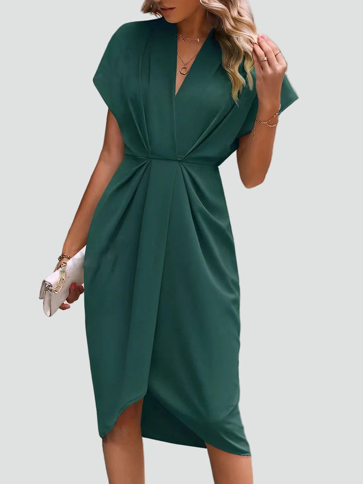 Vielseitiges Damen Midikleid mit Wickeldetail, elegant und bequem für Büro, Abendveranstaltungen oder Freizeit.