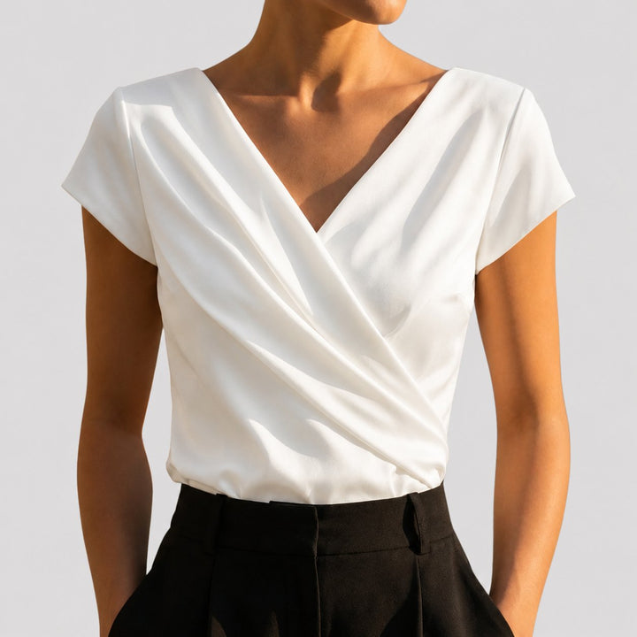 Damen Wickelbluse mit elegantem Wickelschnitt, ideal für Büro und Freizeit, zeitloses, schmeichelhaftes Oberteil.