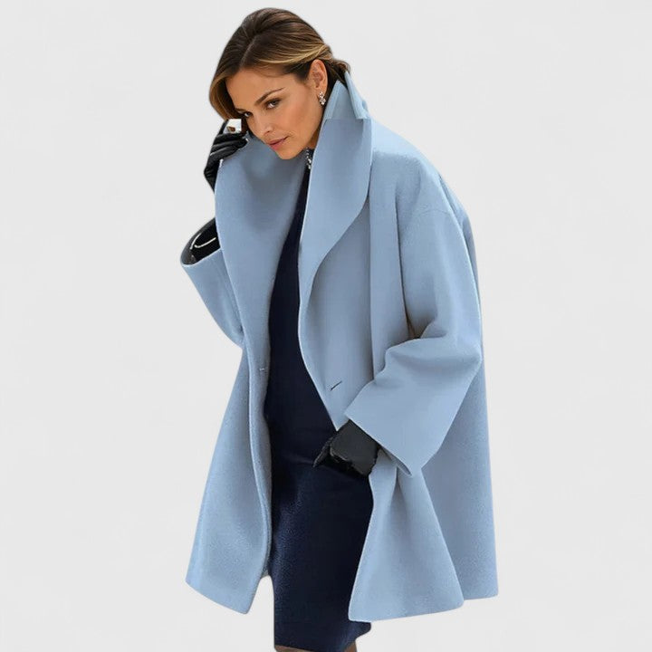Modischer Damen Wintermantel mit lockerem Schnitt und durchgehender Knopfleiste, bietet Wärme und Stil.
