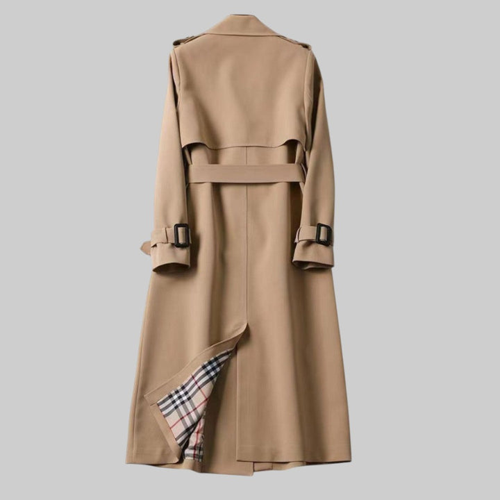 Beigefarbener Damen Zweireihiger Trenchcoat Longline mit Gürtel. Eleganter, klassischer Übergangsmantel.
