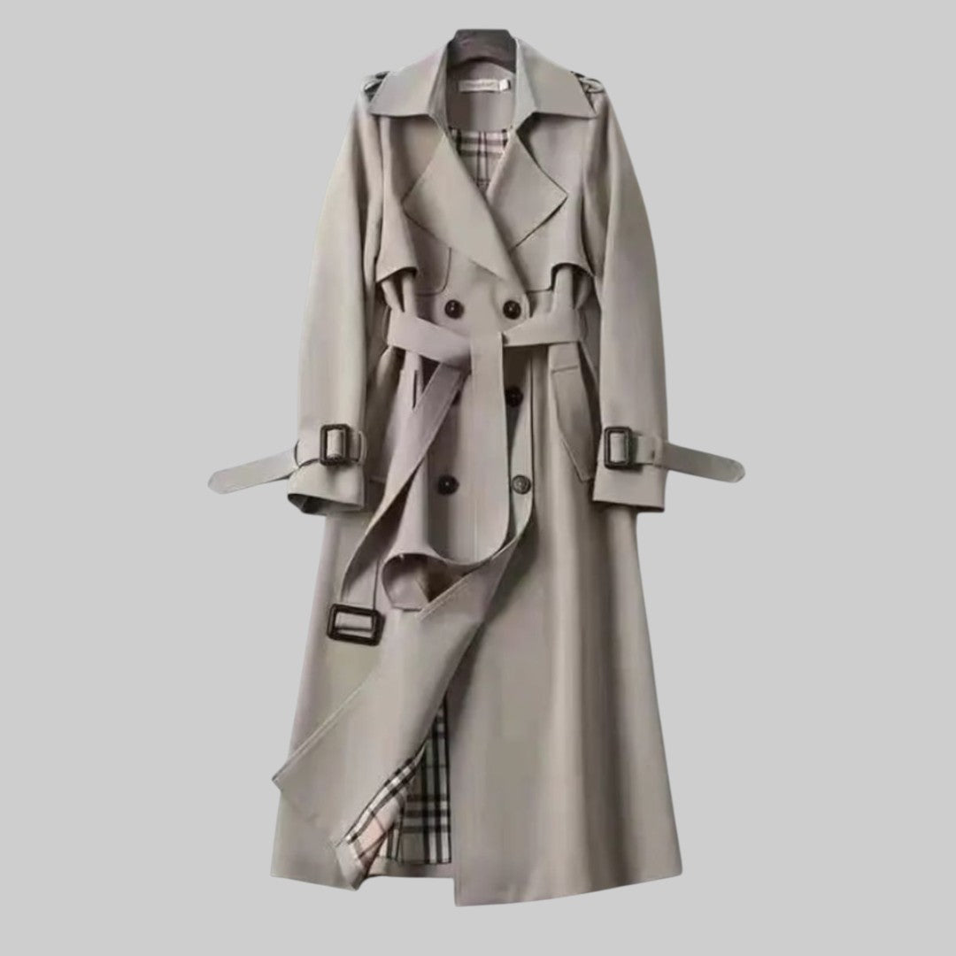 Grauer Damen Zweireihiger Trenchcoat Longline. Klassischer, eleganter Mantel mit Gürtel für Business & Freizeit.