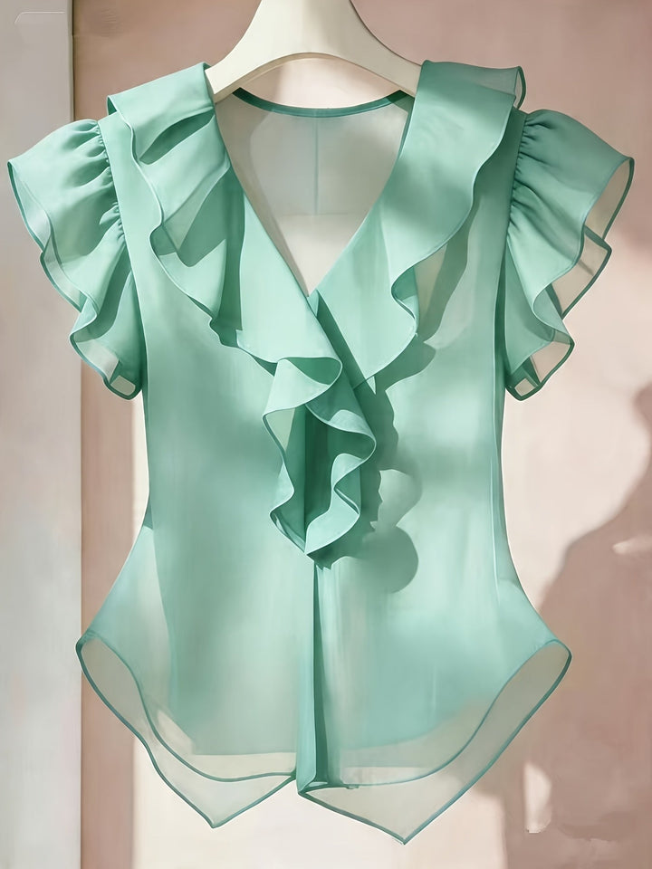 Schicke Rüschenbluse mit Volantärmeln. Unterstreicht Ihre Eleganz.