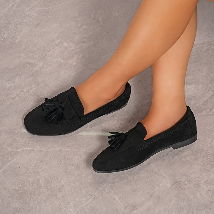 Schwarze Unisex Komfortschuhe, Detail der Fersendämpfung, die Stösse absorbiert.