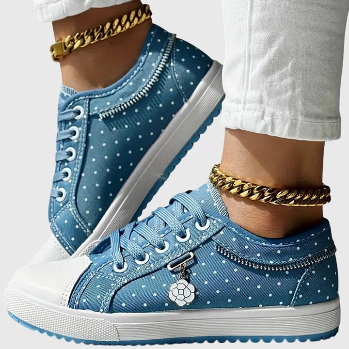 Seitliche Ansicht der stilvollen Damen Ergonomische Sneaker für optimalen Komfort im täglichen Gebrauch.