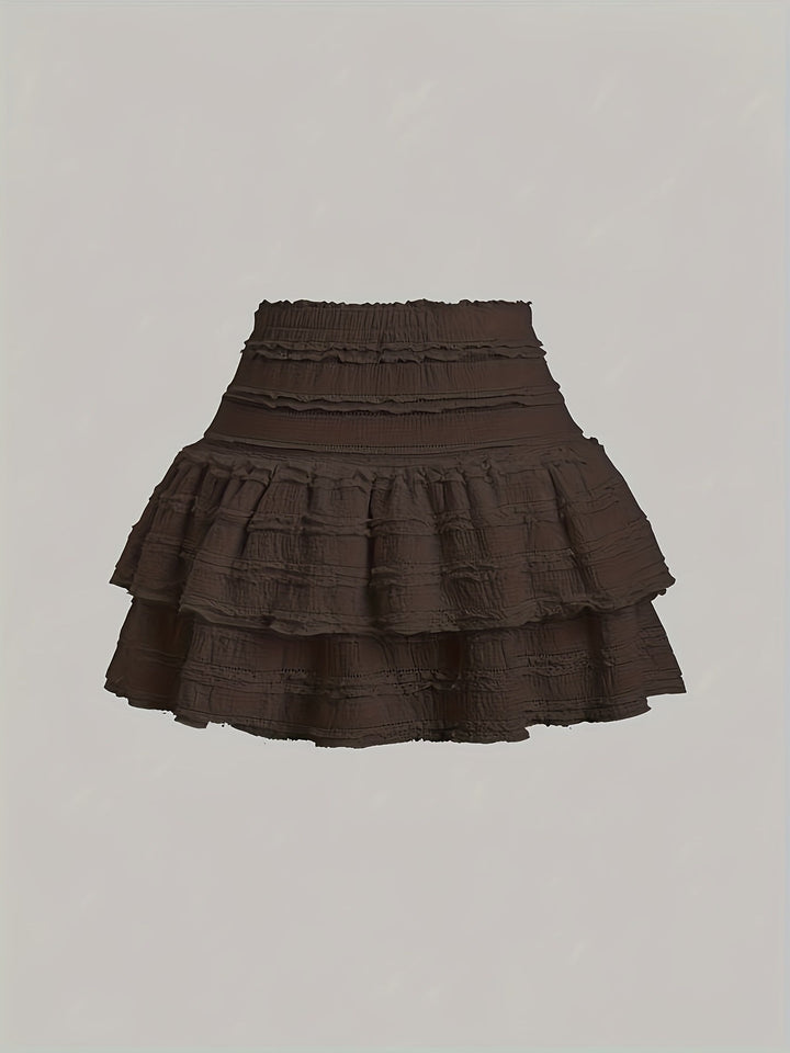 Eleganter Damen Minirock mit romantischen Rüschen und trendigen Stufen, perfekt für einen sommerlichen Freizeit-Look.