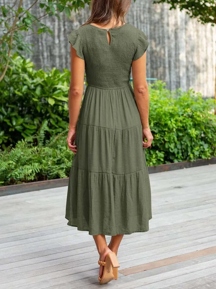 Stilvolles, bequemes Damenkleid, figurbetont. Elegantes Vielzweckkleid für festliche und legere Looks. Kurze Länge.