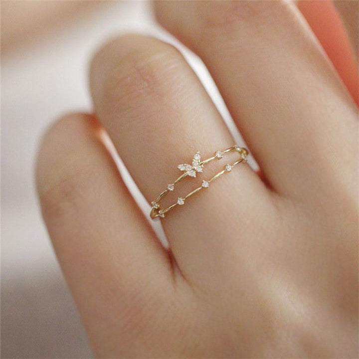 Eleganter Damen-Schmetterlingsring aus Sterlingsilber mit funkelnden Zirkonia, verstellbar. Perfektes Geschenk.