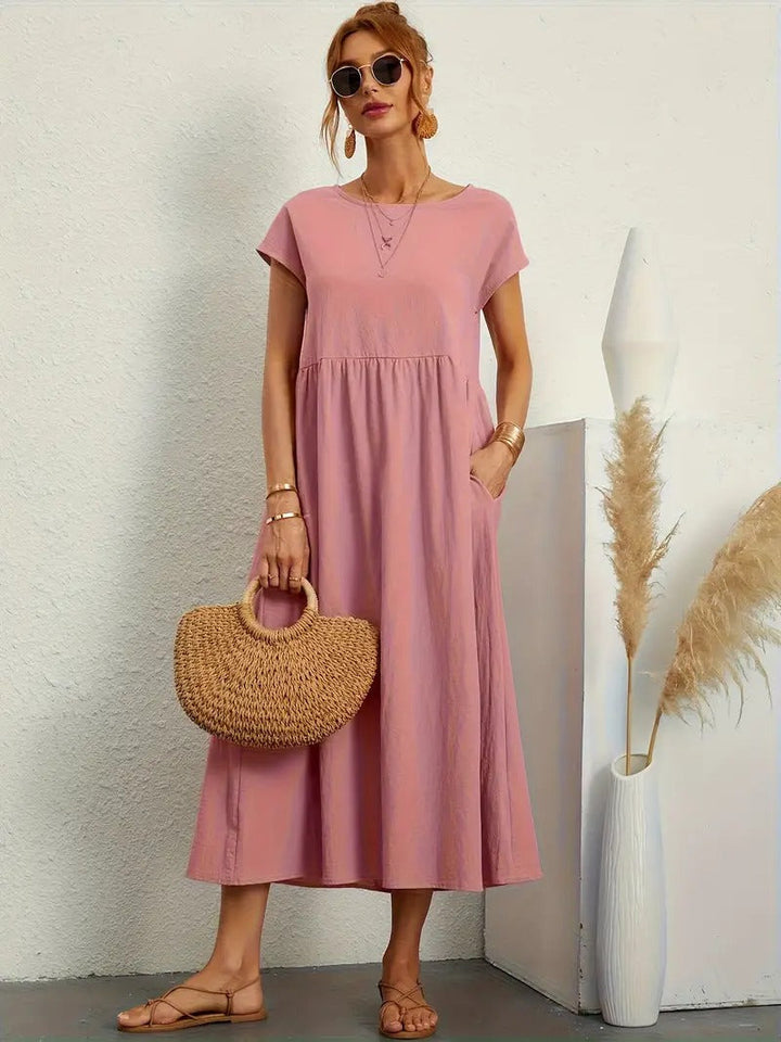 Stylisches Midikleid für Damen, ideal als vielseitiges Frühlingskleid mit Taschen.
