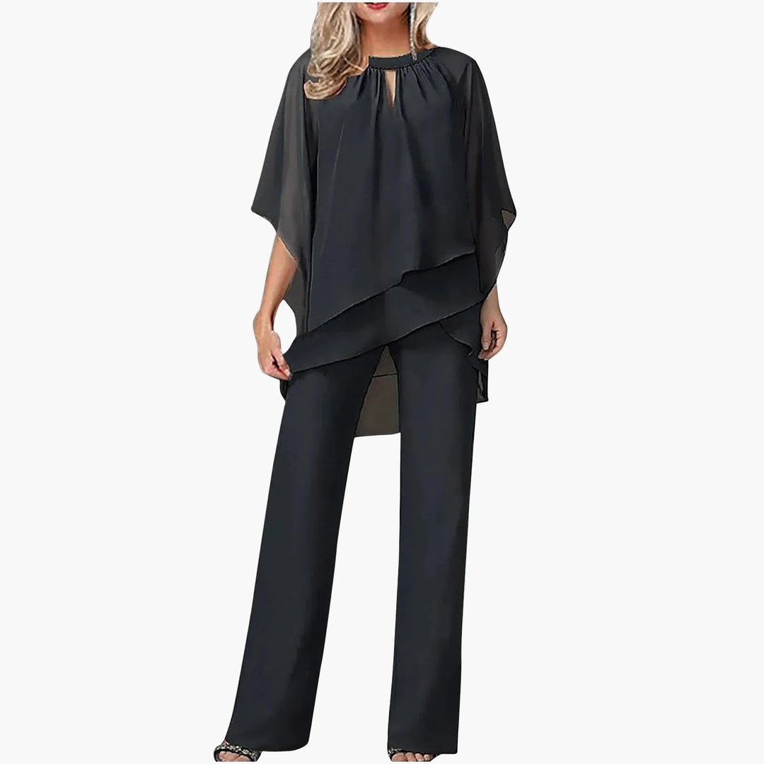 Moderner Damen Anzug Set für besondere Anlässe. Eleganter Jumpsuit mit Überwurf & weitem Bein, ideal für Abendmode.