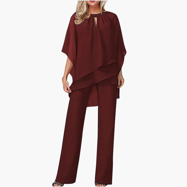 Festlicher Damen-Overall mit Keyhole Ausschnitt, weitem Bein & fließendem Überwurf. Perfekt für Gala & Hochzeit.