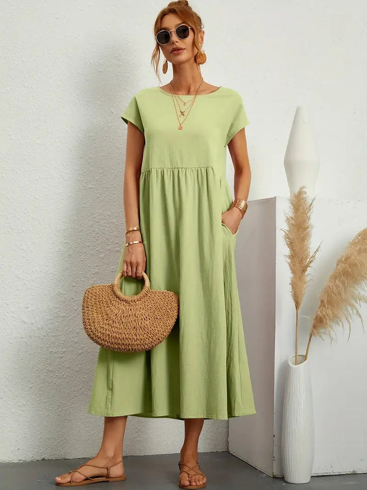 Vielseitiges Damenkleid, Midi-Länge, mit praktischen Taschen, perfekt für Frühling & Sommer.