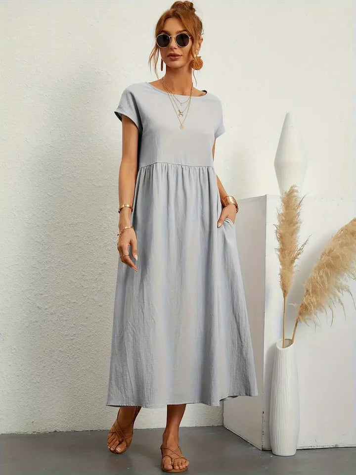 Damen Frühlingskleid in Midi-Länge mit praktischen Taschen; elegantes & lässiges Outfit.