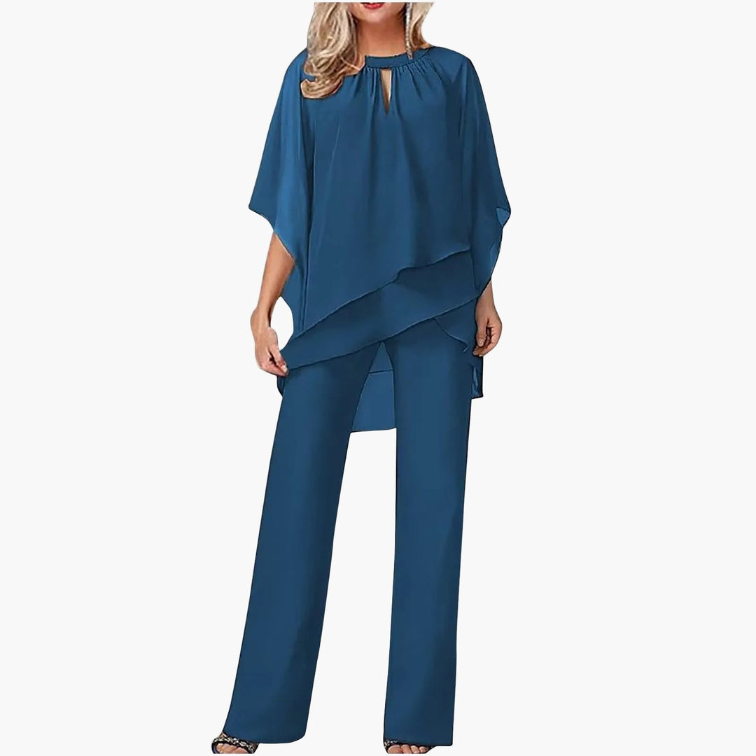 Stilvoller Damen-Hosenanzug festlich. Elegante Kleidung mit fließendem Überwurf, Keyhole Ausschnitt & weitem Bein.