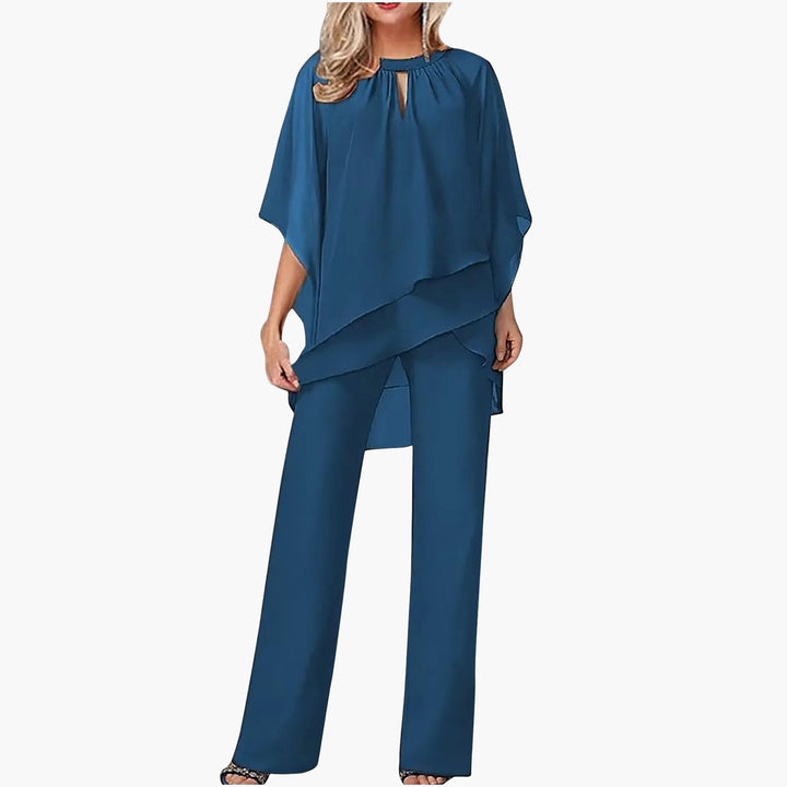 Stilvoller Damen-Hosenanzug festlich. Elegante Kleidung mit fließendem Überwurf, Keyhole Ausschnitt & weitem Bein.