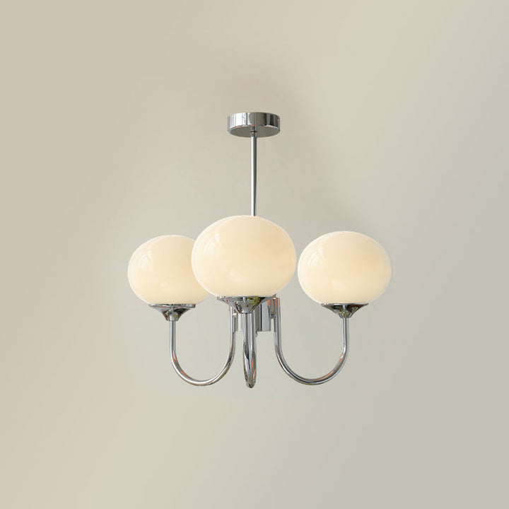 Roségold-Kronleuchter, Gesamtansicht in einem eleganten Esszimmer; harmonisches Raumdesign.