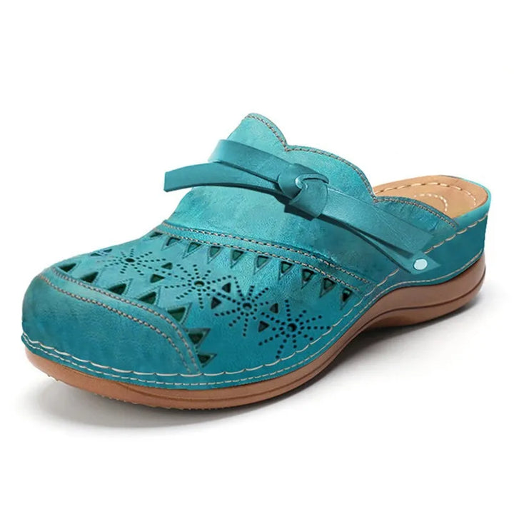 Bequeme Damen Hausslipper mit weichem Memory-Schaum und orthopädischer Fußgewölbestütze für den Alltag.