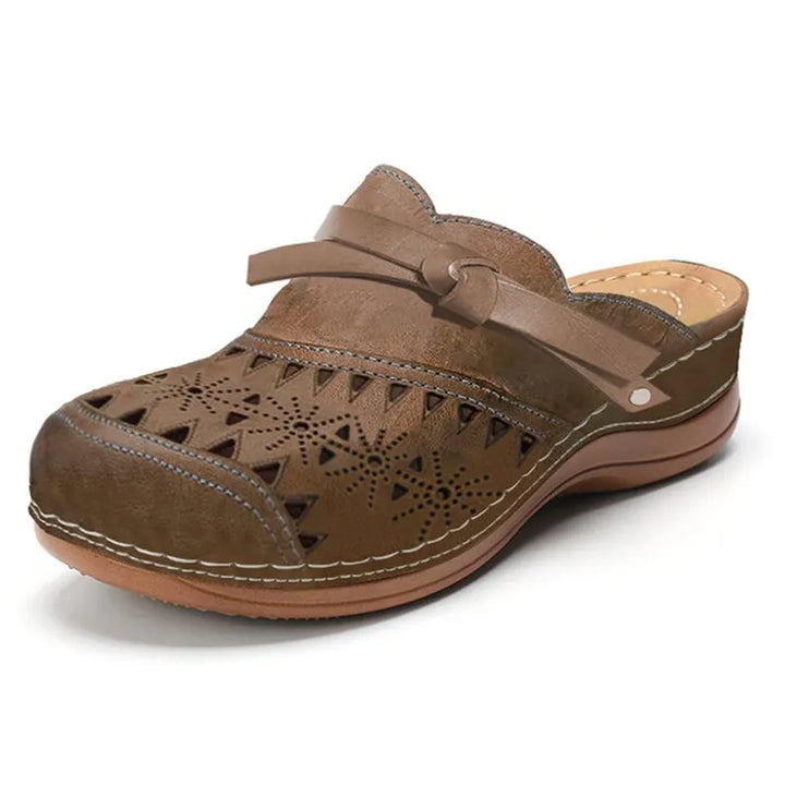 Orthopädische Damenschuhe: Slipper mit Memory-Schaum und integrierter Fußgewölbestütze für besten Halt.